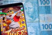 Celular com jogo do tigrinho aberto 